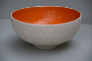 Carved serving bowl in tangerine
