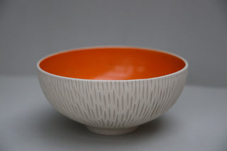 Carved serving bowl in tangerine