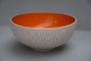 Carved serving bowl in tangerine