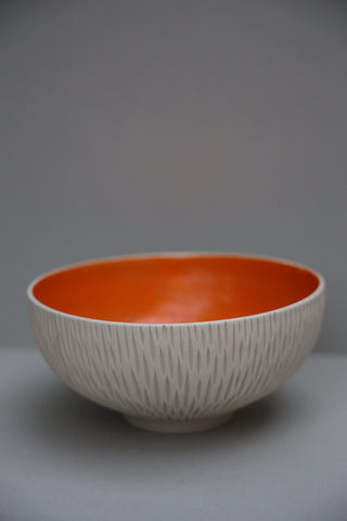 Carved serving bowl in tangerine
