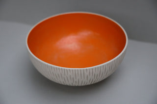 Carved serving bowl in tangerine