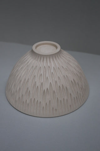 Carved deep serving bowl in cantaloupe