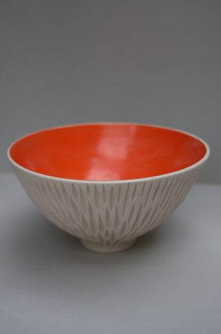 Carved deep serving bowl in cantaloupe