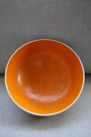 Carved serving bowl in tangerine
