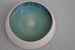 Carved serving bowl in ocean