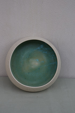 Carved serving bowl in ocean