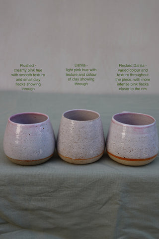 Pair of large pink-flecked tea cups or coffee mugs with handle (sample)