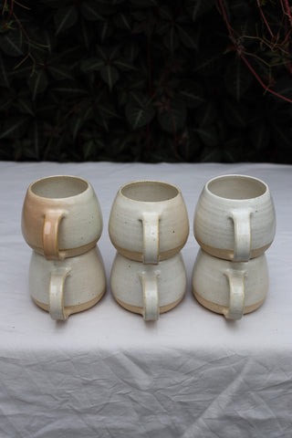 Pair of standard tea cups or coffee mugs with handle in arctic