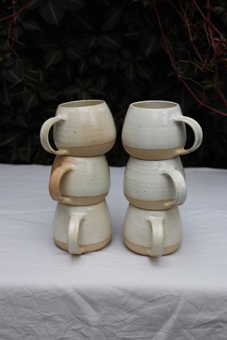 Pair of standard tea cups or coffee mugs with handle in arctic