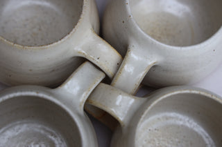 Pair of standard tea cups or coffee mugs with handle in arctic