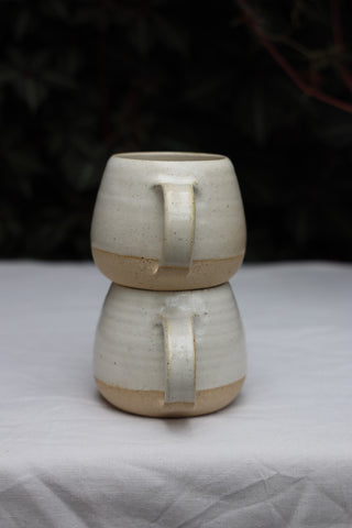 Pair of standard tea cups or coffee mugs with handle in arctic