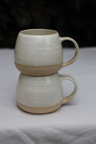 Pair of standard tea cups or coffee mugs with handle in arctic