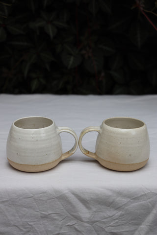 Pair of standard tea cups or coffee mugs with handle in arctic