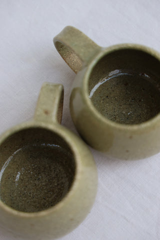 Pair of petite tea cups or coffee mugs with handle
