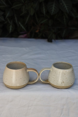 Pair of petite tea cups or coffee mugs with handle