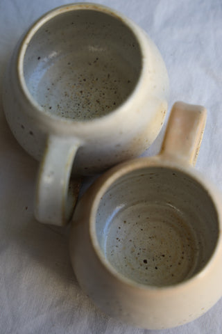 Pair of petite tea cups or coffee mugs with handle
