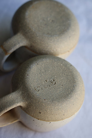 Pair of petite tea cups or coffee mugs with handle