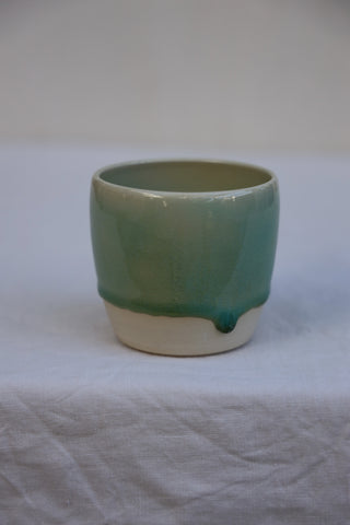 Latte cup in ocean