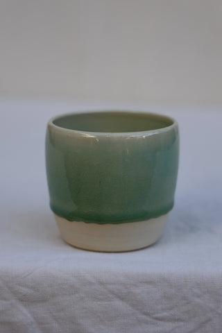 Latte cup in ocean