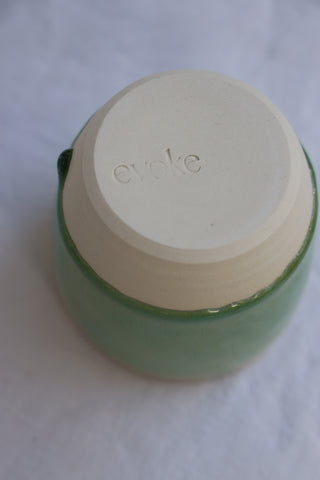 Latte cup in ocean