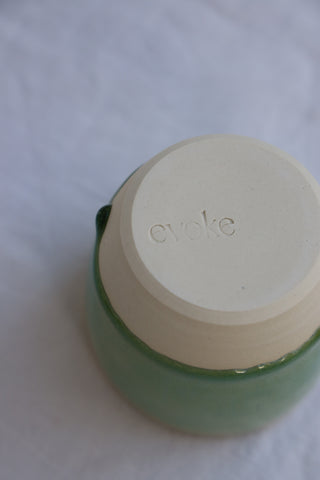 Latte cup in ocean