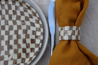 Set of four Chickedey-Checkedey plates with matching napkin rings