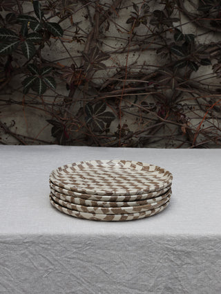 Set of four Chickedey-Checkedey plates with matching napkin rings