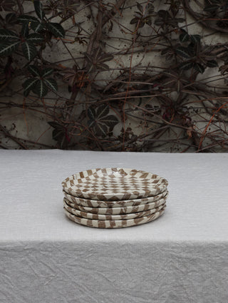 Set of four Chickedey-Checkedey plates with matching napkin rings