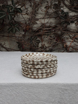 Set of four Chickedey-Checkedey plates with matching napkin rings