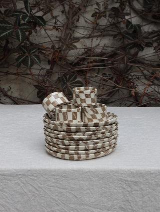 Set of four Chickedey-Checkedey plates with matching napkin rings