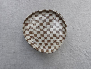 Set of four Chickedey-Checkedey plates with matching napkin rings