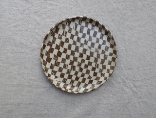Set of four Chickedey-Checkedey plates with matching napkin rings