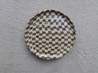 Set of four Chickedey-Checkedey plates with matching napkin rings