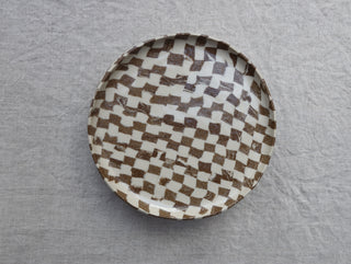 Set of four Chickedey-Checkedey plates with matching napkin rings