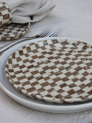 Set of four Chickedey-Checkedey plates with matching napkin rings