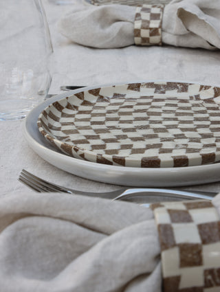 Set of four Chickedey-Checkedey plates with matching napkin rings