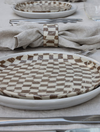 Set of four Chickedey-Checkedey plates with matching napkin rings