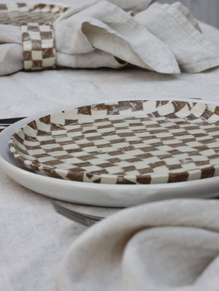 Set of four Chickedey-Checkedey plates with matching napkin rings