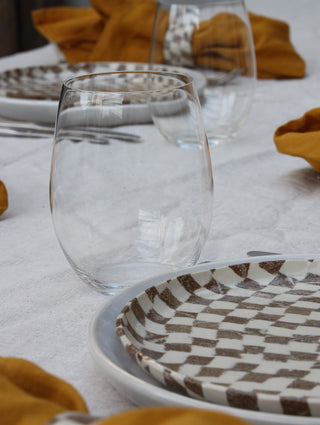 Set of four Chickedey-Checkedey plates with matching napkin rings