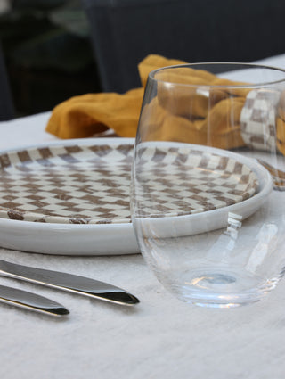 Set of four Chickedey-Checkedey plates with matching napkin rings