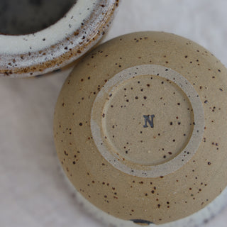 Anti-spill travel cup
