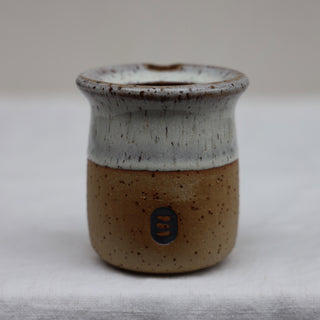 Anti-spill travel cup