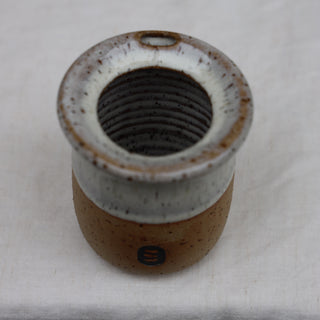 Anti-spill travel cup