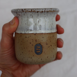 Anti-spill travel cup