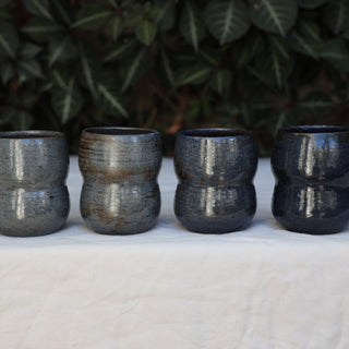 Set of four coffee cups (sample)
