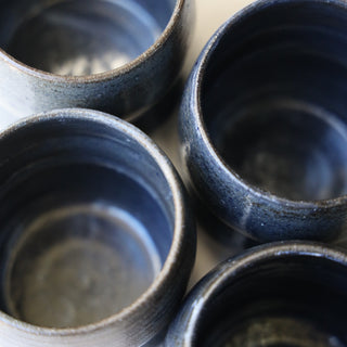 Set of four coffee cups (sample)