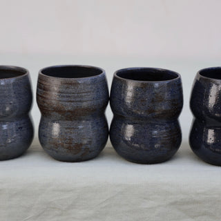 Set of four coffee cups (sample)