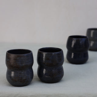 Set of four coffee cups (sample)